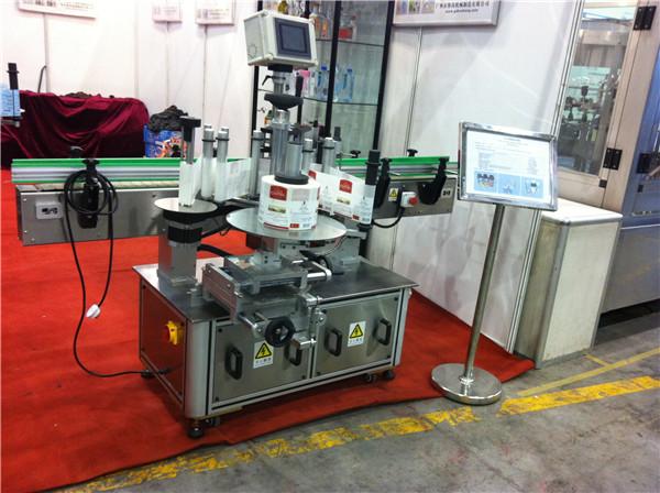 哈密瓜/火龙果汁圆瓶贴标机饮料领域