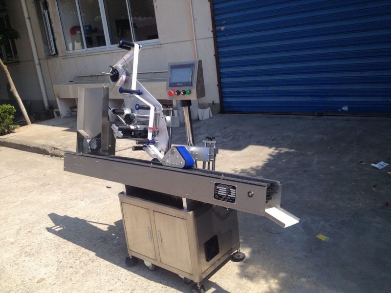 中国12-25mm直径圆形瓶不干胶贴纸自动贴标机，用于唇膏化妆品供应商