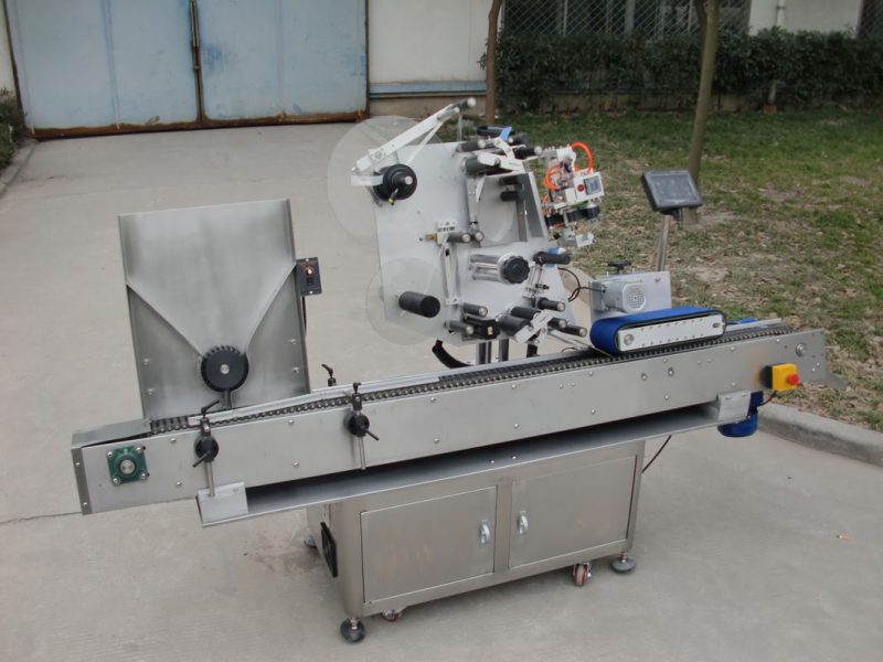 中国输送电机HY品牌小瓶贴标机，第七届电子标签电池贴标机供应商