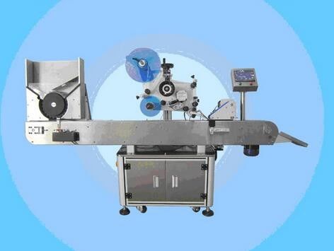 中国自动瓶贴标机指甲油标签贴纸机化妆品供应商