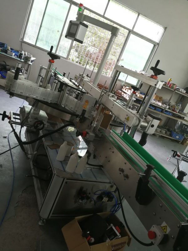 不干胶标签贴标机正面和背面，瓶子贴标机