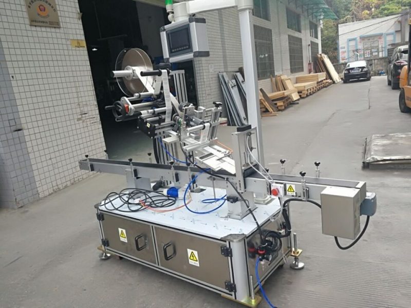 中国喷嘴袋电动驱动式不干胶贴标机供应商